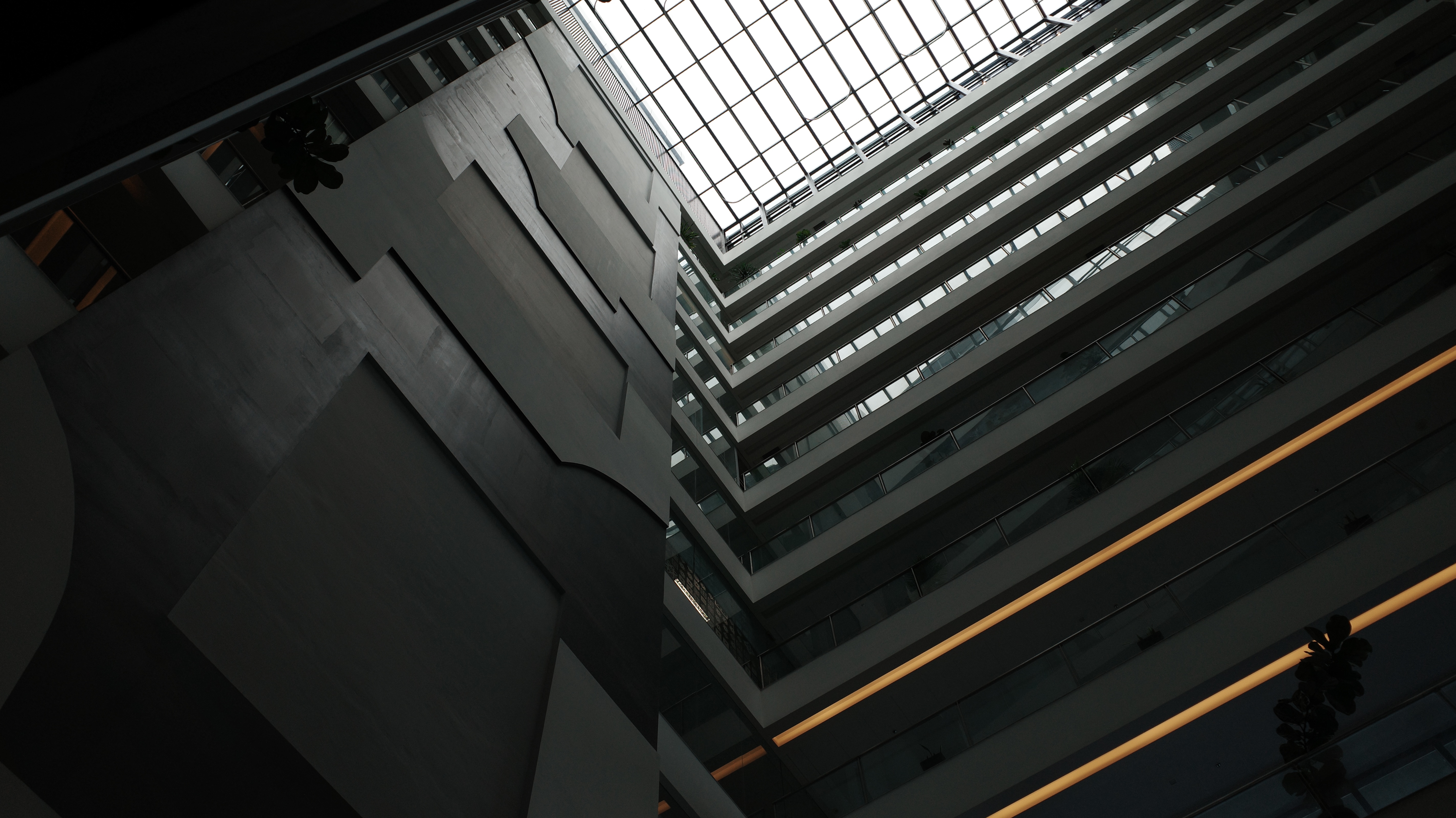 Ground-level view of a building showcasing its architectural design and surrounding environment.