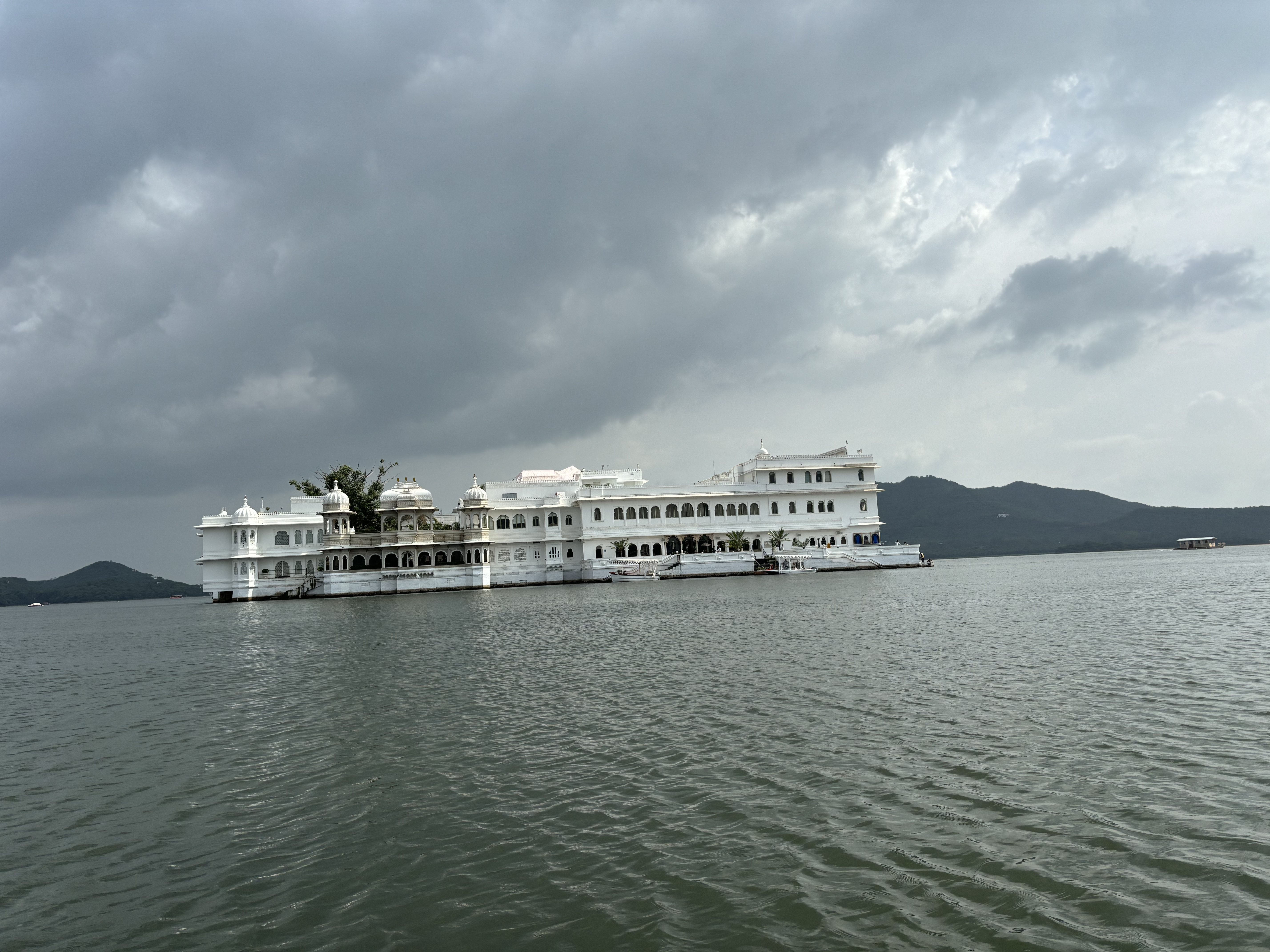 Stunning view of Jal Mahal (Palace surrounded by Water) located in Udaipur taken from boat in lake.