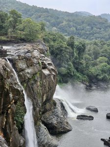 Side view of Athirappilly Falls. Where water and nature harmonize. A famous tourist spot in Kerala. 