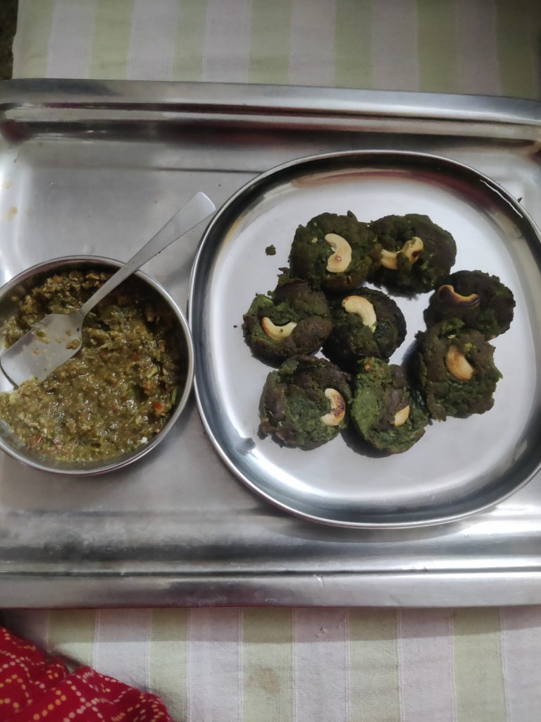 Savoring the flavors of homemade Hara Bhara Kabab with a side of chutney.