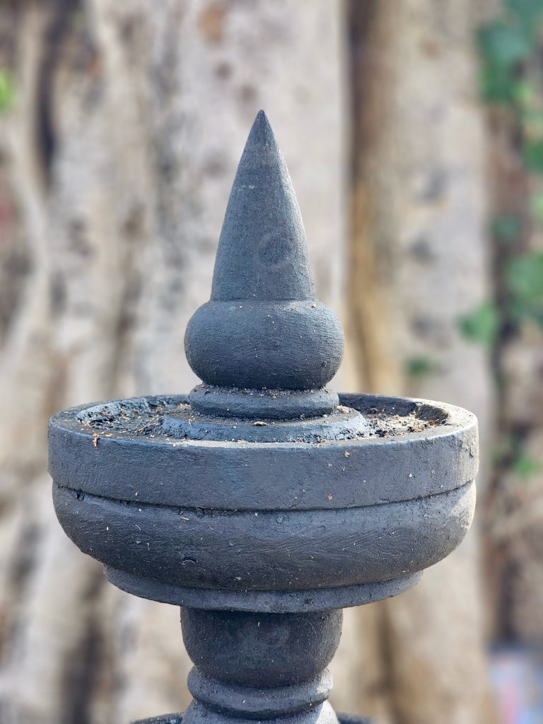 An Antique stone lamp. The beauty of traditional craftsmanship from Kerala.