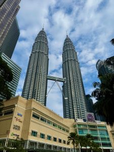 Petronas Twin Towers in Kuala Lumpur, Malaysia, with their distinctive design and sky bridge connecting the two skyscrapers.
