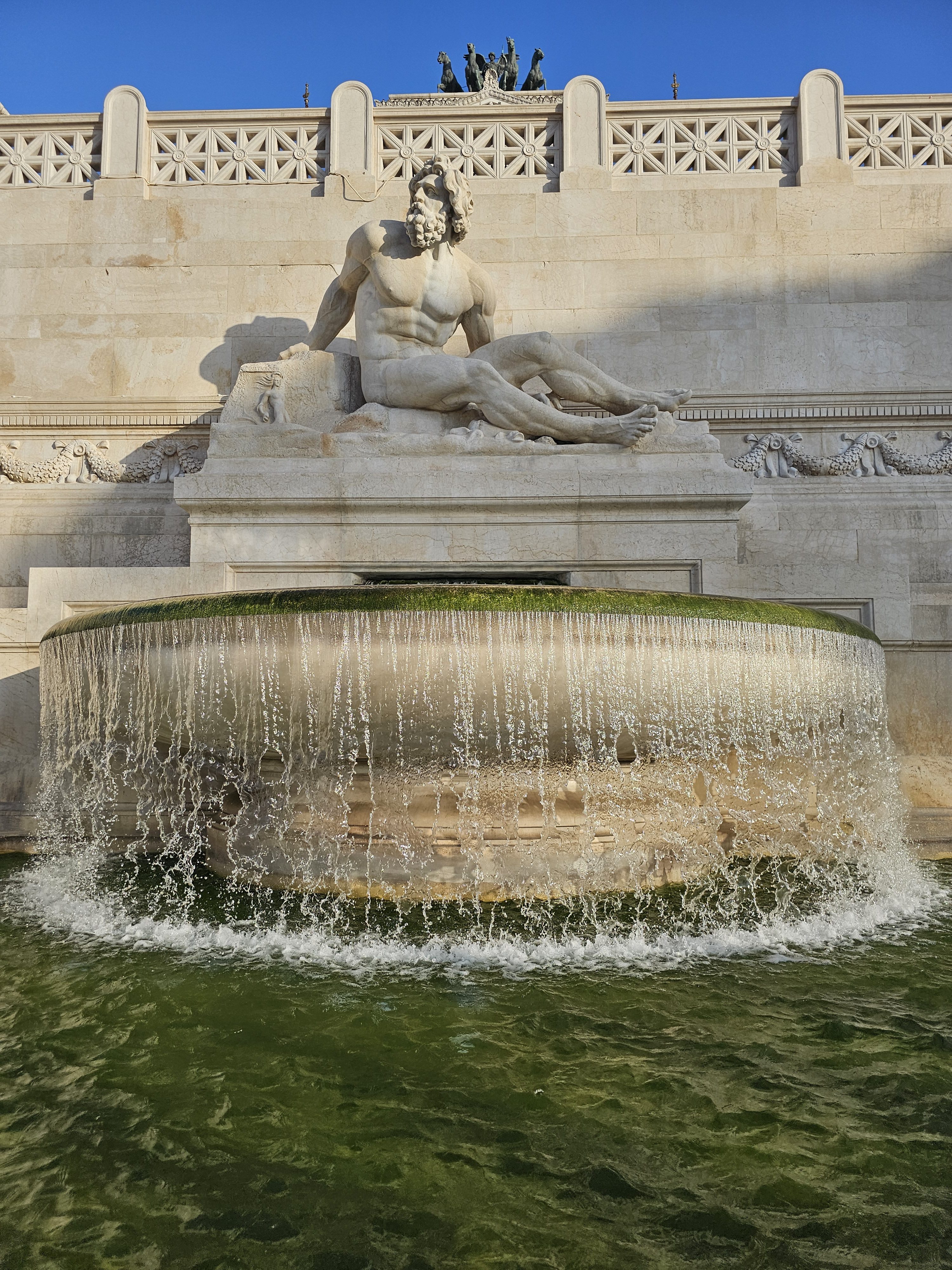 The Fountain of the Tyrrhenian Sea, which is part of the Altare della Patria (also known as the Victor Emmanuel II National Monument) in Rome, Italy.