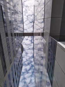 Two tower connected with a bridge, clear sky in background.
