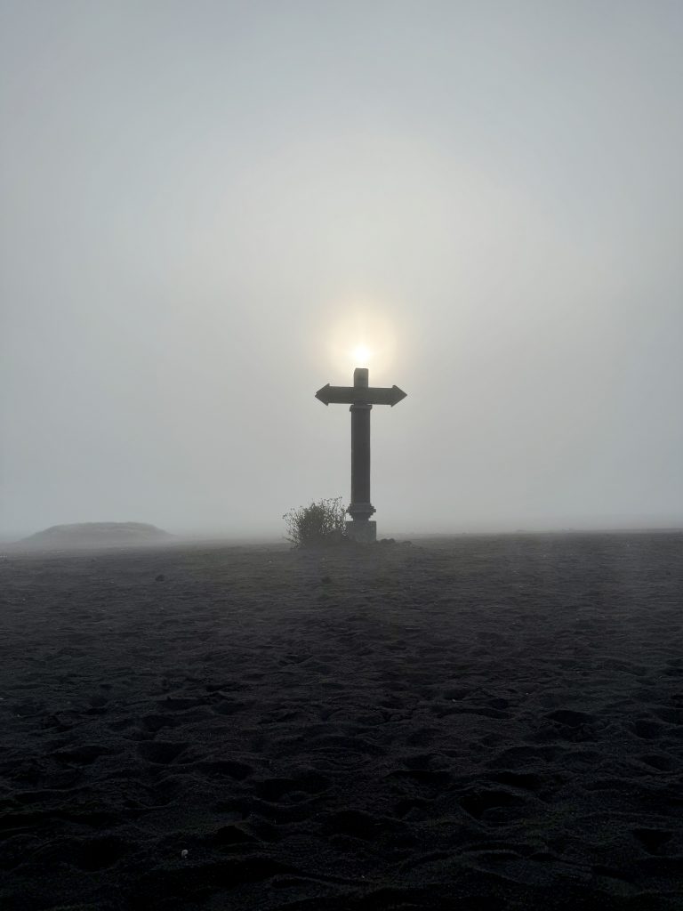 A cross in the middle of Tengger Caldera near Mount Bromo volcano.The caldera is surrounded by a plain of fine volcanic sand.