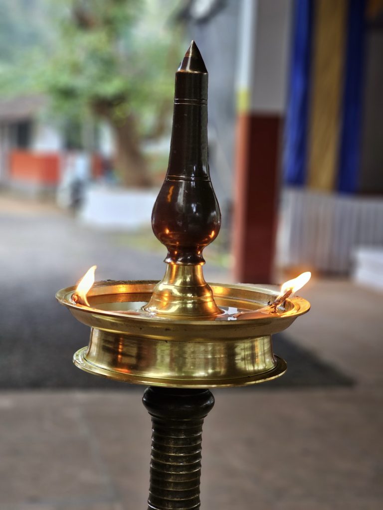 Nilavilakku, a traditional lamp of Kerala (made of brass), spreading its light.