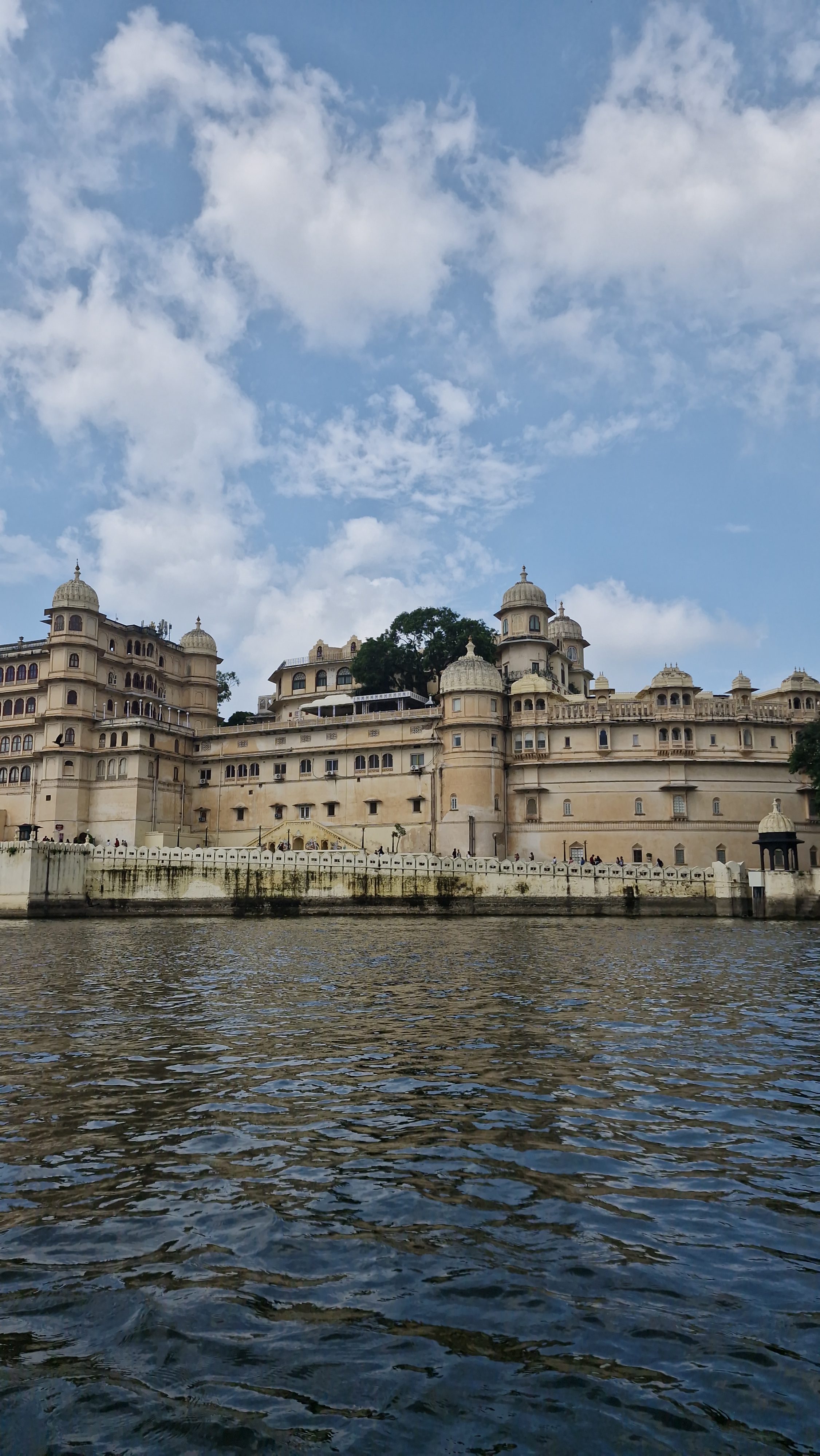 The City Palace is located in the heart of the old town Udaipur beside Lake Pichola. The palace complex has been built entirely in granite and marbles.