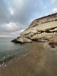 Image of a beach and cliff of Cabo de Gata in Almeria at dawn with the sea calm