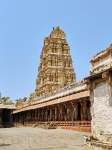 This is the Virupaksha Temple in Hampi, featuring a towering, intricately carved gopuram.
