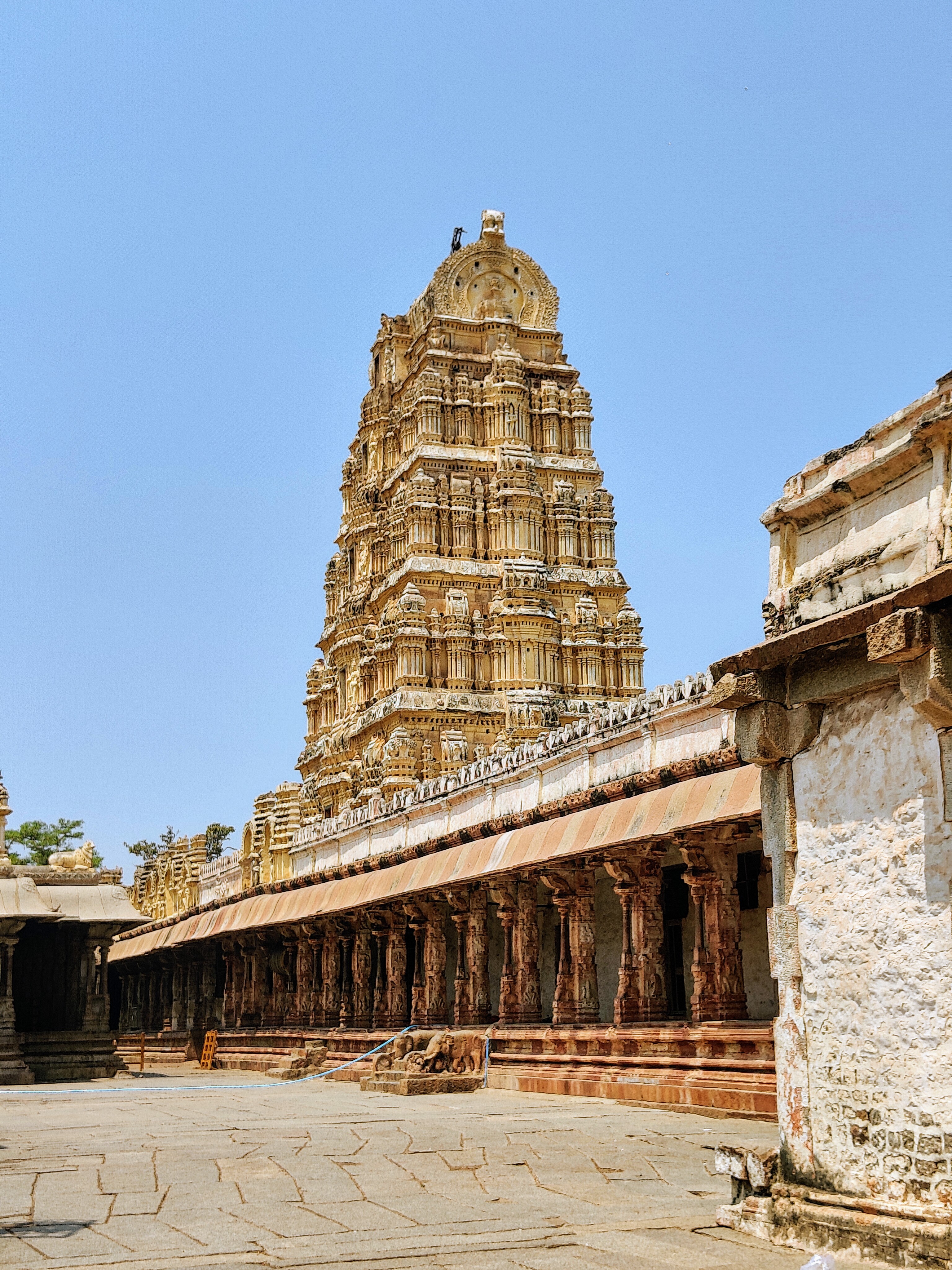 This is the Virupaksha Temple in Hampi, featuring a towering, intricately carved gopuram.