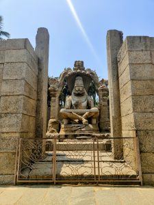 The Ugra Narasimha statue in Hampi is a massive monolithic sculpture of Lord Narasimha, an avatar of Vishnu, seated fiercely under the hood of the serpent Adishesha. Built in 1528 AD during the Vijayanagara Empire, it's one of Hampi's most iconic and powerful representations.