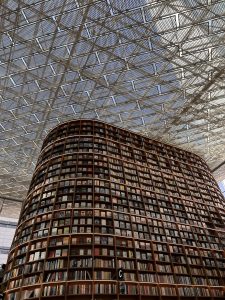 A spacious building that houses a large library, emphasizing its role as a center for knowledge and community engagement.