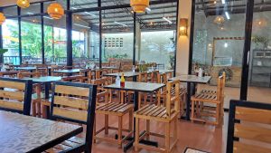 Restaurant tables and chairs arrangement in empty settings