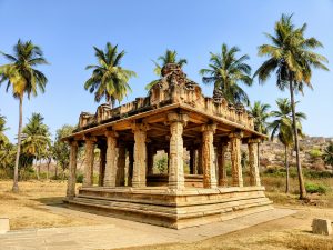 A beautifully carved stone pavilion in Hampi, known as a mandapa. 