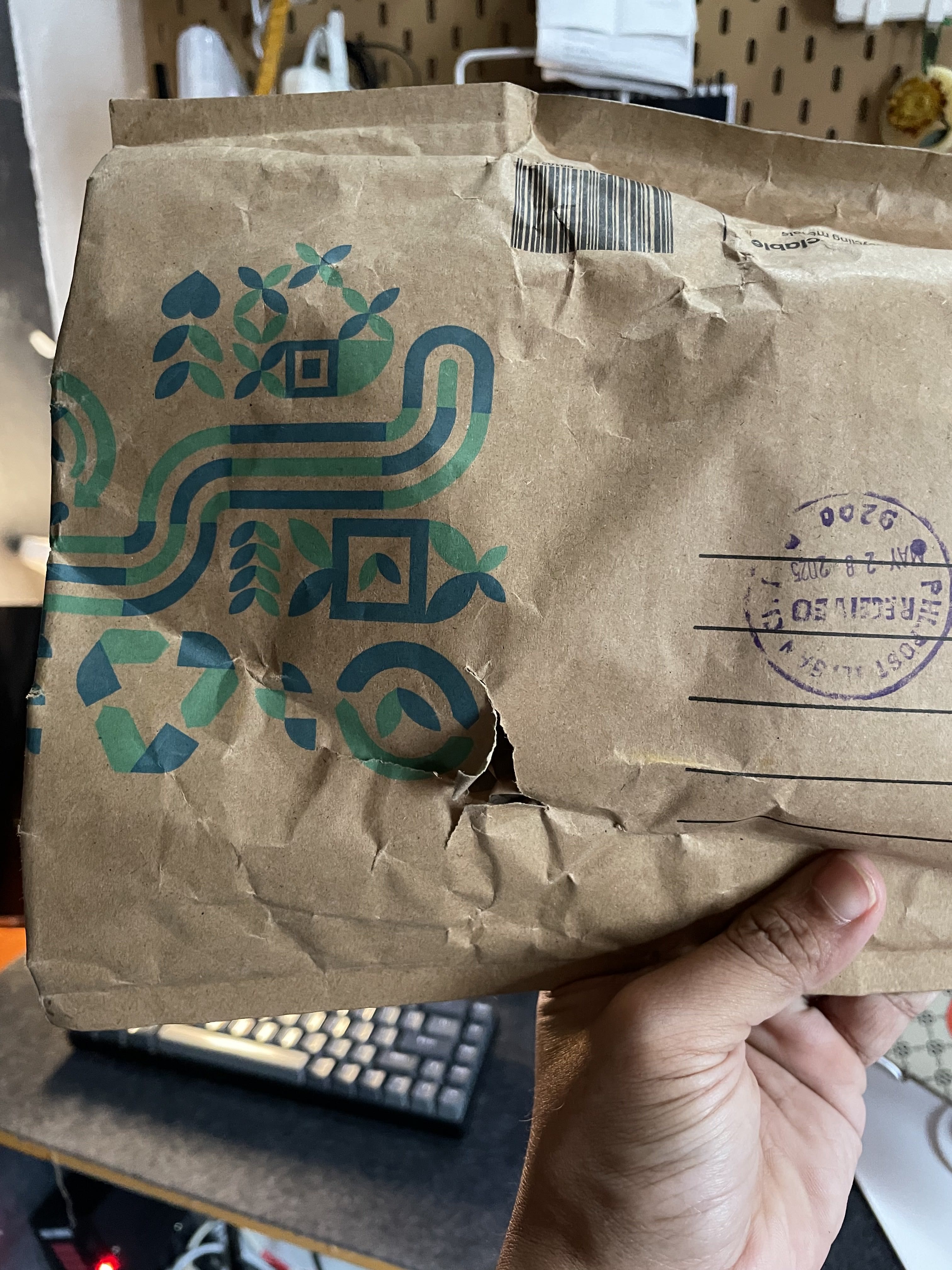 A parcel from Singapore with the background of a home office.