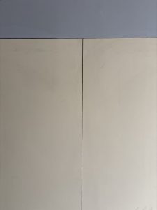 A simple image featuring two rectangular panels. 