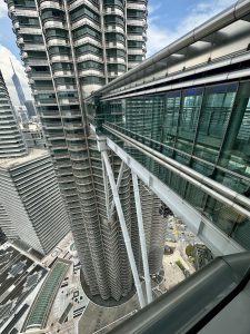 Skybridge connecting the iconic Petronas Twin Towers, offering stunning views of Kuala Lumpur’s skyline.