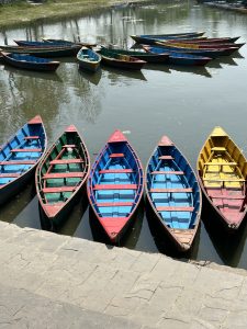 Traditional water boats waiting for passenger to pick them up.