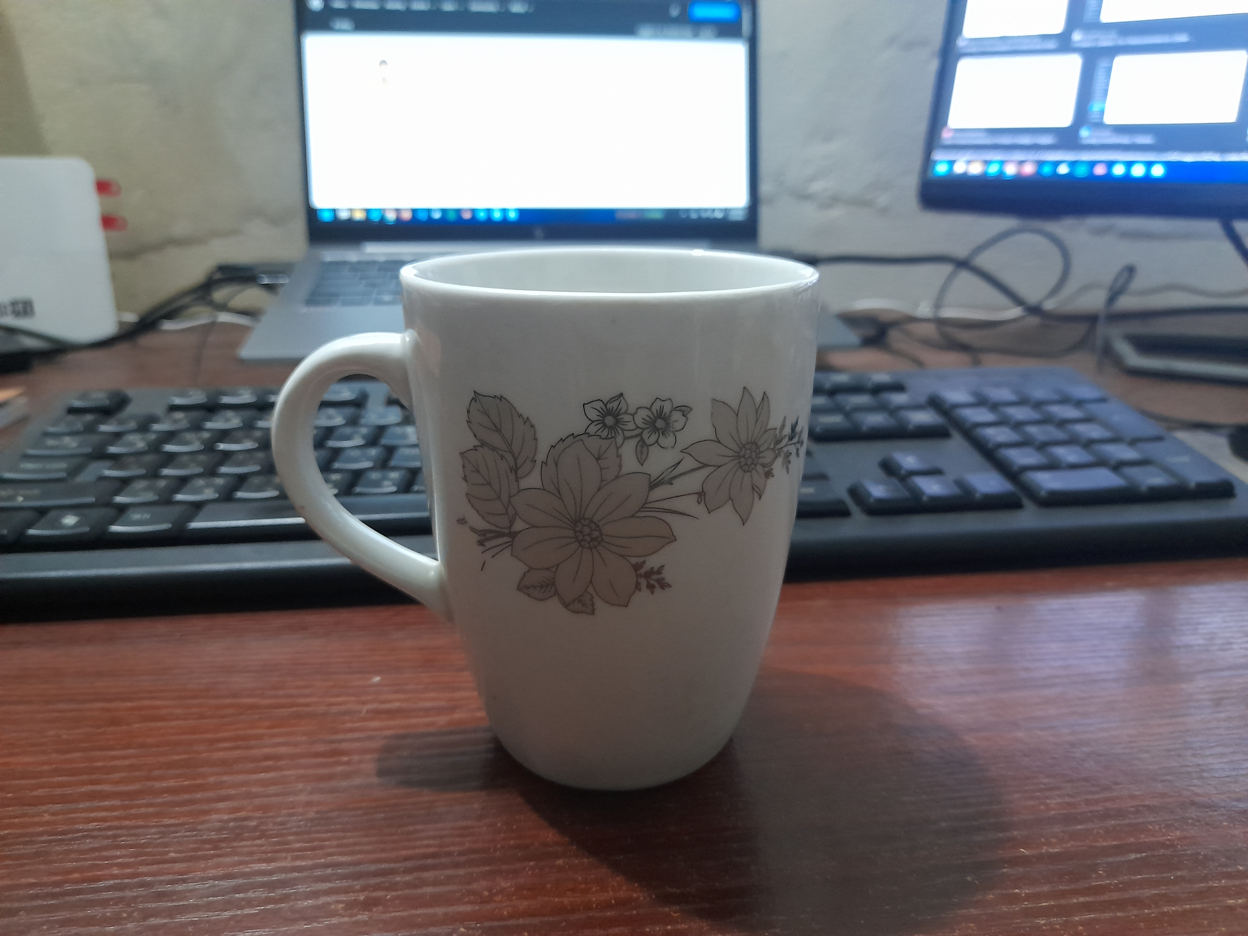 A White Coffee Cup on the Table.