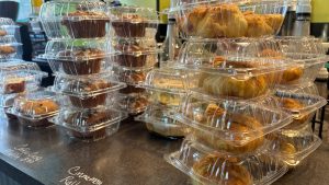 Various sweet breads in plastic pods for sale.