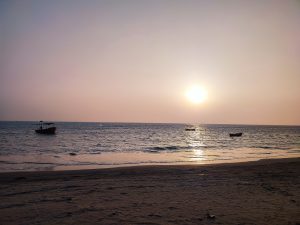 Sunset at Saint Martin’s Island with gentle waves lapping the shore.