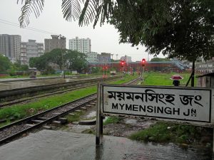 A picture of a Mymensingh Junction, a railway station in Bangladesh. The railway track, traffic signals and nearby tall buildings are visible in the background #SummerPhotoContest