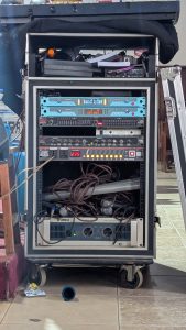 Audio karaoke system with some visible wires and microphones