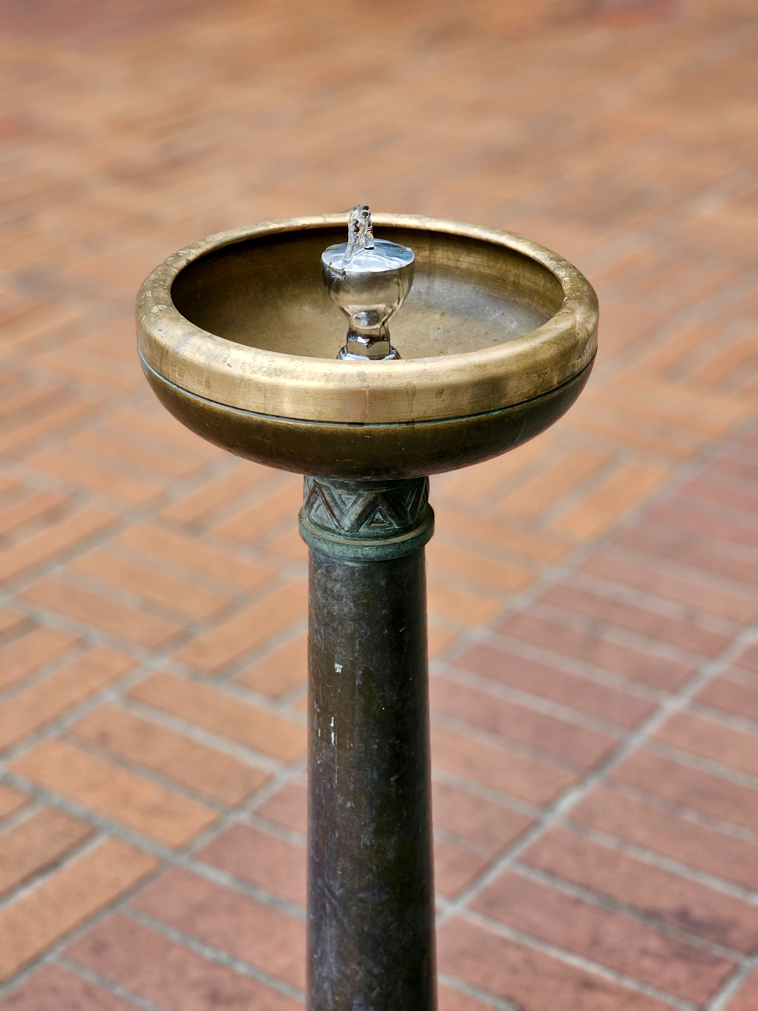 A Benson Bubbler, an iconic bronze drinking fountain found throughout Portland, Oregon, known for its continuous water flow