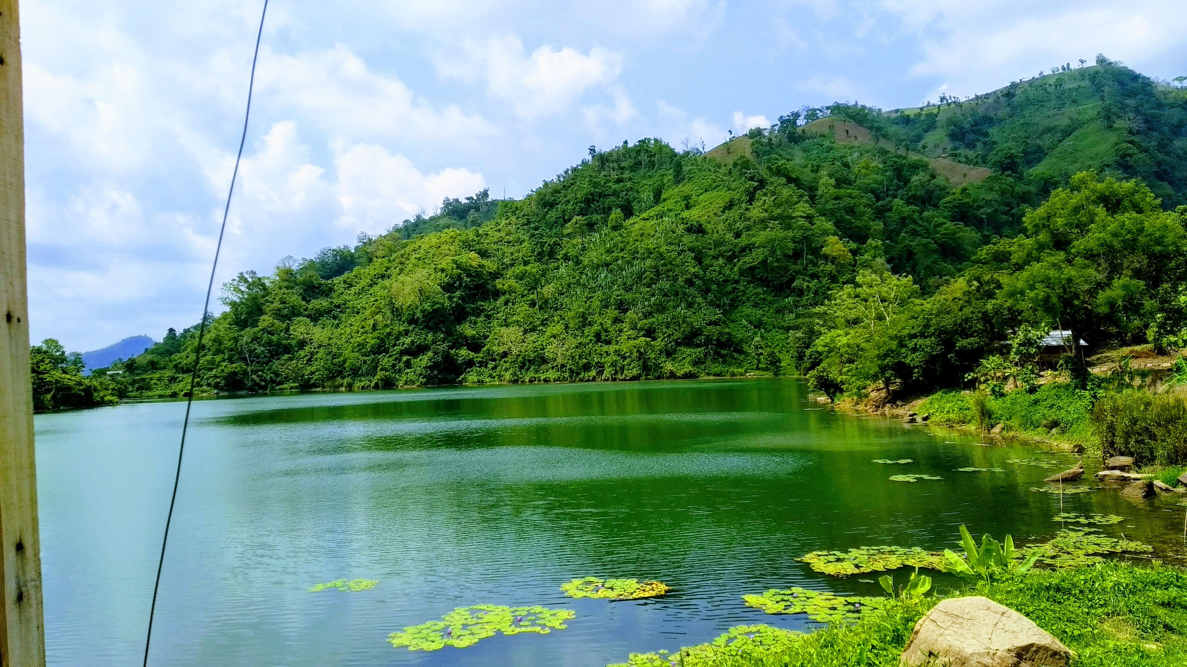 It's a proper natural image. This place name is Boga Lake in Bandarban, Bangladesh. Green view all over. It gives you a positive impact.