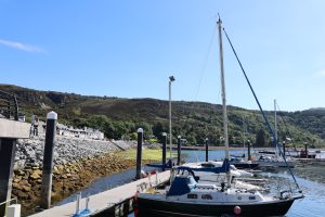 Sailing boats moored in Ullapool Marina, Scottish Highlands.