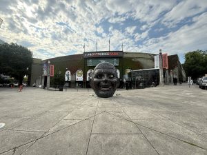 A sculpture of a human face made of metal outside Providence Park stadium in Portland, Oregon. 