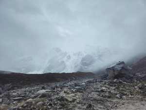 A rugged mountainous landscape under a cloudy sky. 