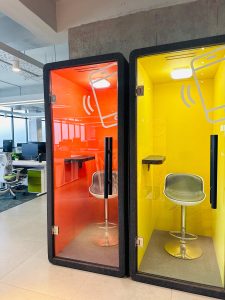 A modern office space with 2 Teliphone Booths
