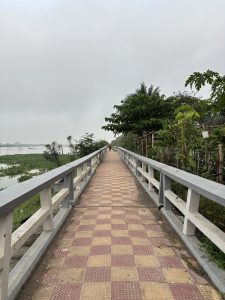 The image shows the Turag River Walk way in Dhaka, Bangladesh