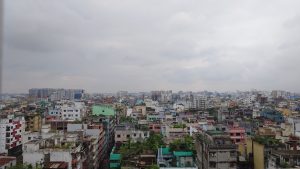 A panoramic view of the city skyline from a high-rise building, showcasing tall buildings and the urban landscape of Mohammadpur, Dhaka, Bangladesh.