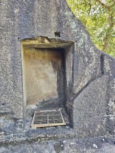 A small rock-cut niche used for rainwater harvesting at Kanheri Caves, Mumbai. This shallow space is carved into the stone wall, showing the simple yet skillful work of the early builders.