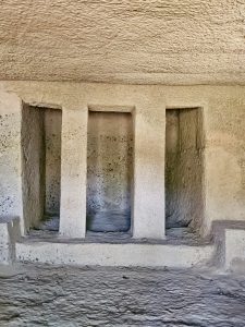 A simple stone opening carved into the inner wall of a cave in Kanheri hills, Mumbai, showing the ancient craftsmanship of the site. 