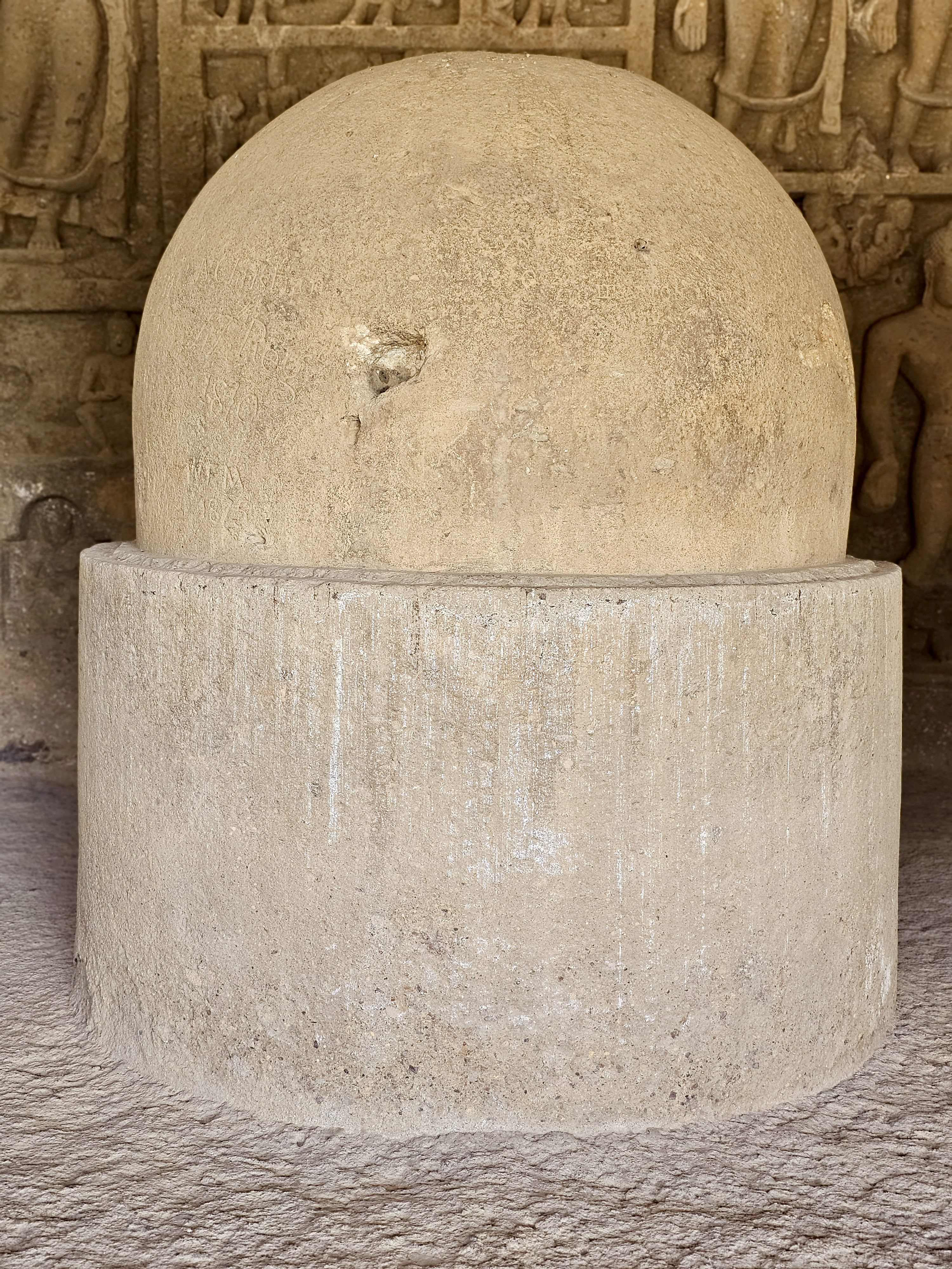 A stone stupa inside the Kanheri Caves, carved from a single rock. This sacred structure reflects the peaceful Buddhist heritage of the site. 