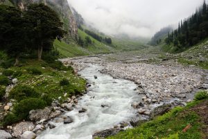 Photo of river flowing through the Kullu valley.  Location Chikka (often spelled Chika) besides Rani River ( also known as Hampta River) on the route to Hampta Pass trek.
