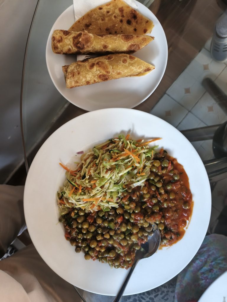 A simple Kenyan classic chapati with green peas stew and a fresh kachumbari salad.