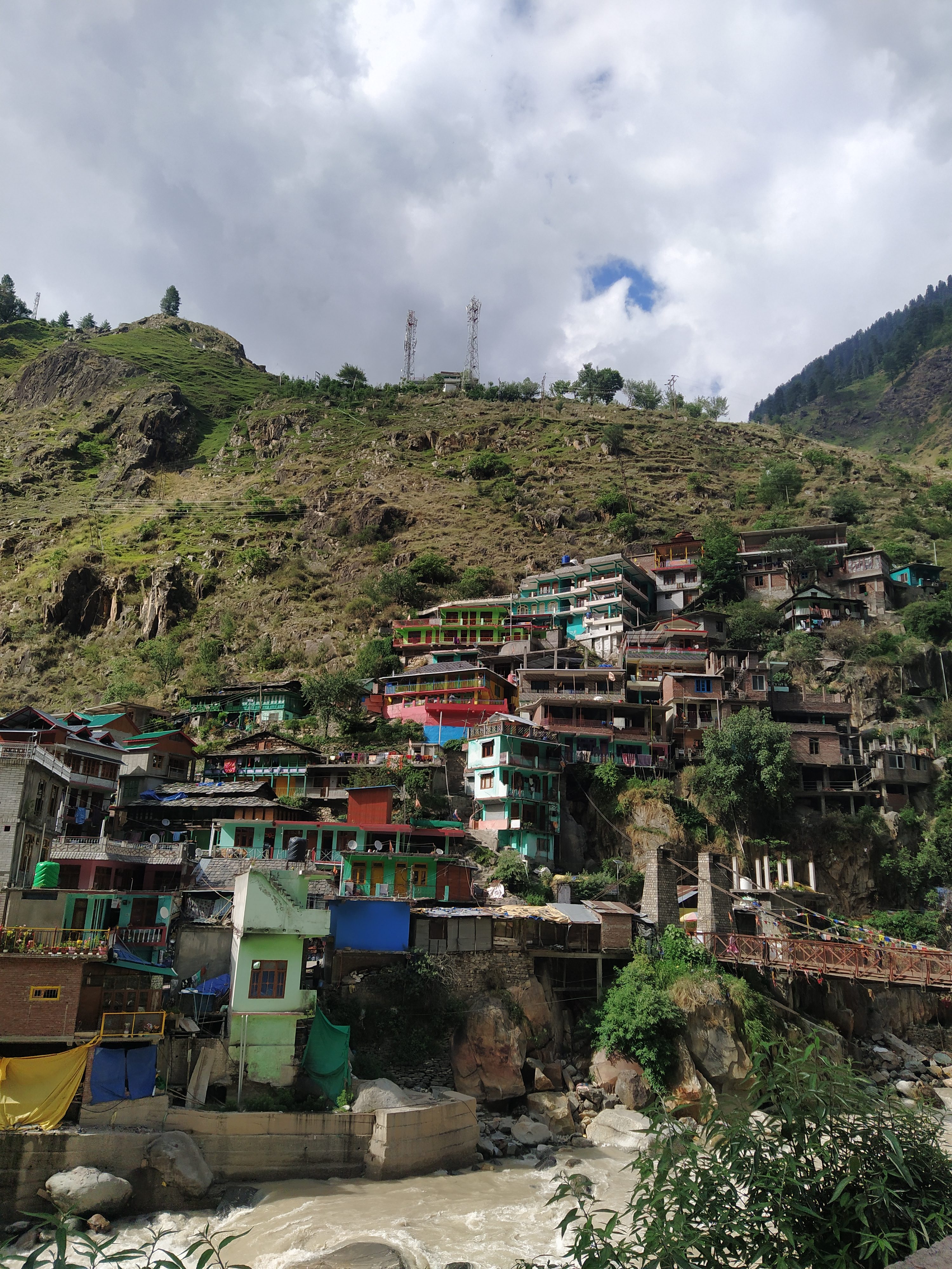 Houses built along the slopes of the hills.