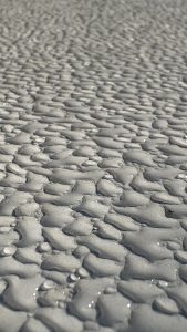 Drops on a table surface at dusk
