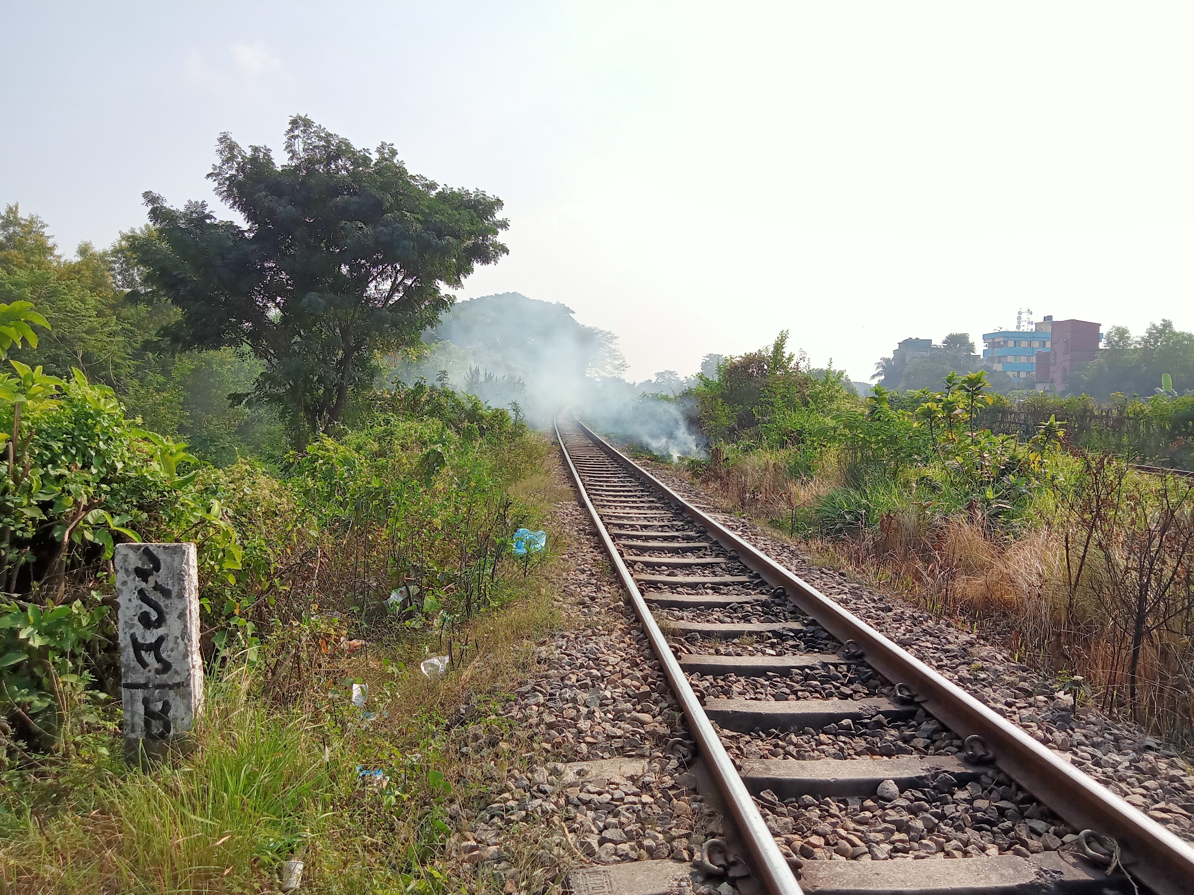 Railway track with a pillar at Kawtoli, Brahmanbaria, Bangladesh.