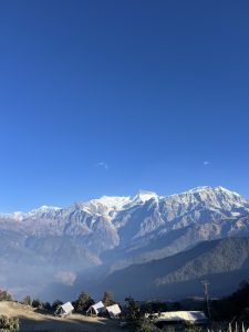 
A breathtaking view of snow-capped mountains under a clear blue sky.