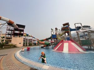 A vibrant Fishtail Dream Park with colorful water slides and fun attractions.