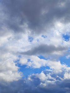 Cloudy sky with dark and light clouds and some blue patches, Costa Rica.
