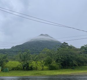 Cloudy day with fog partially covering Arenal Volcano, Costa Rica.
