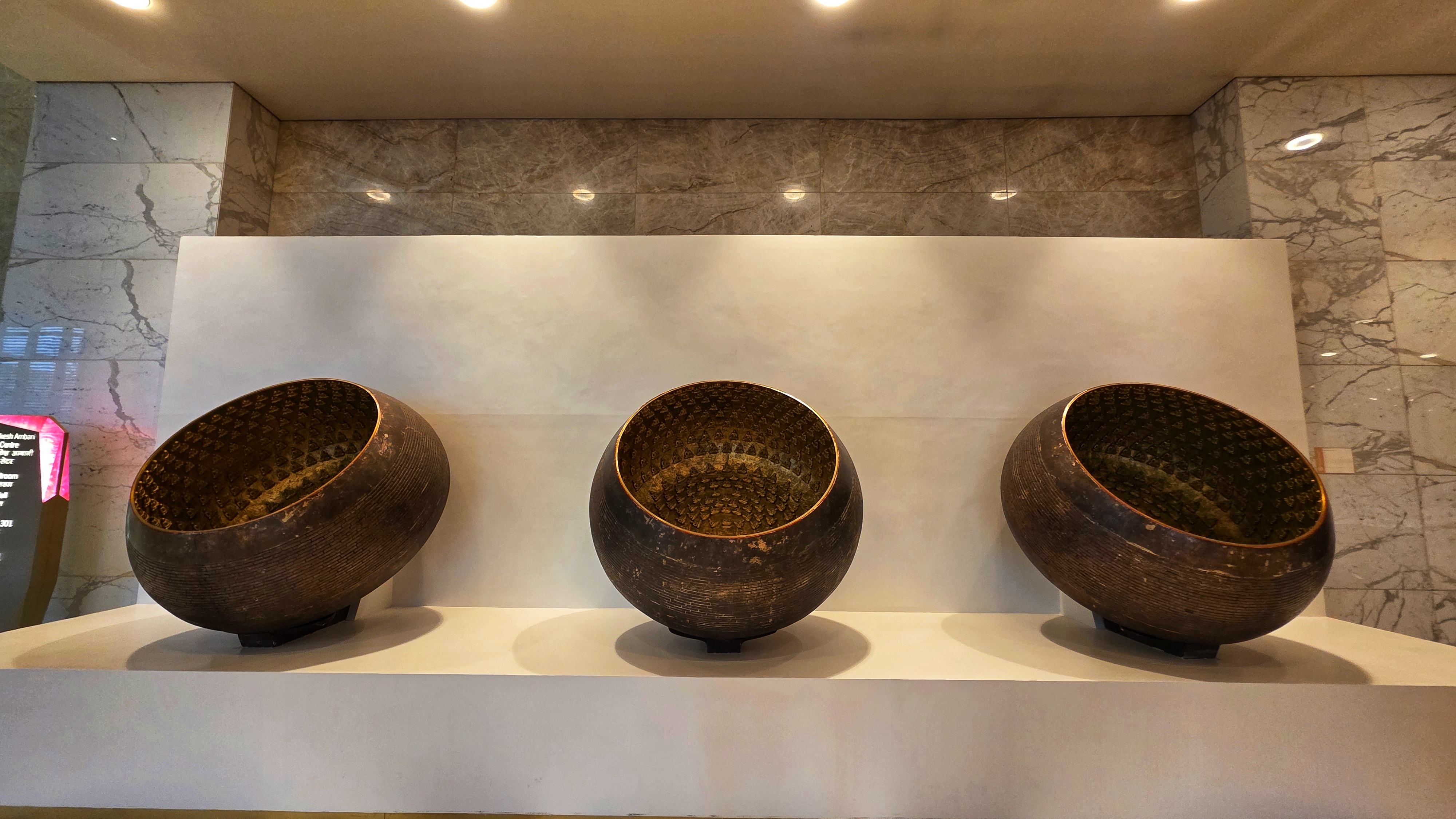 Large decorative metal bowls from the venue of WordCamp Asia 2026