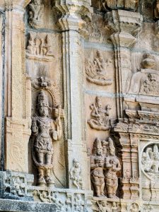 Fine stone carvings of deities and detailed granite pillars at the Vidyashankara Temple.
