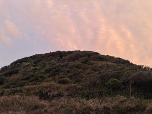 夕焼け空の小山　/　A small hill against the sunset sky